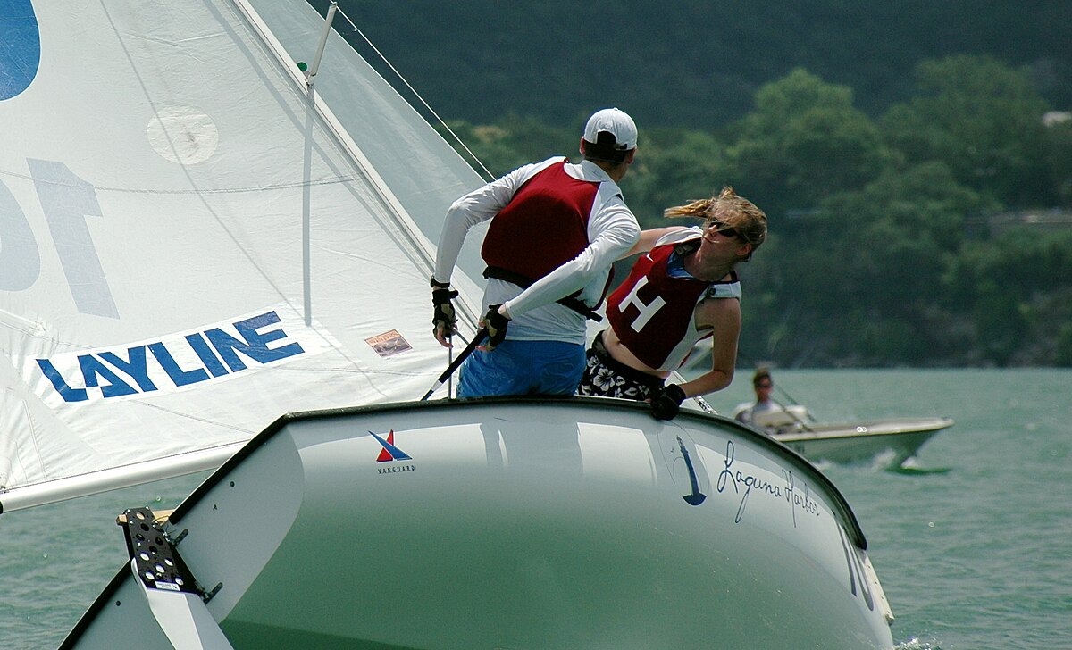 Sailor performing a roll tack in light wind